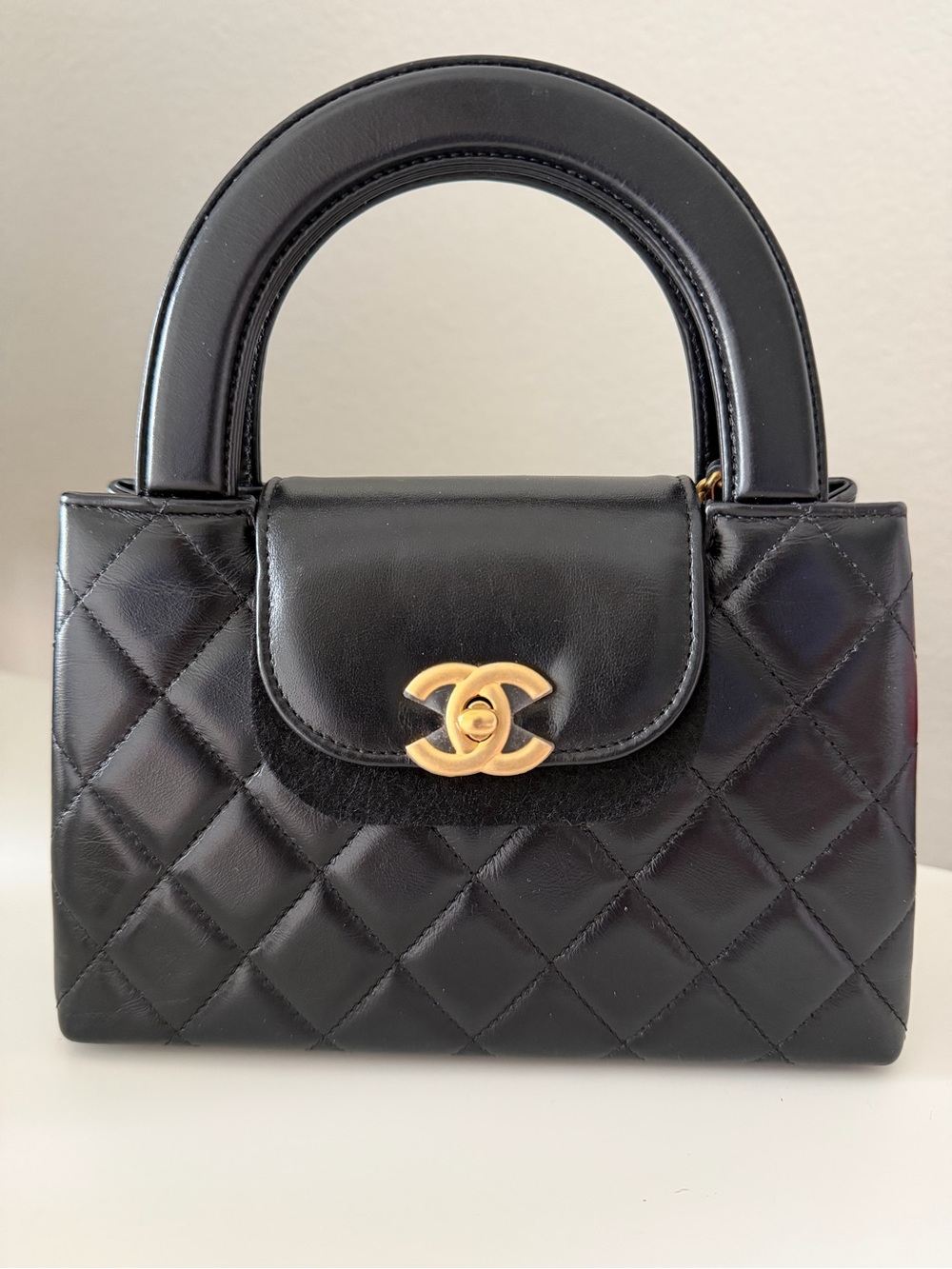 CHANEL Kelly Nano Black Top Handle with Gold CC